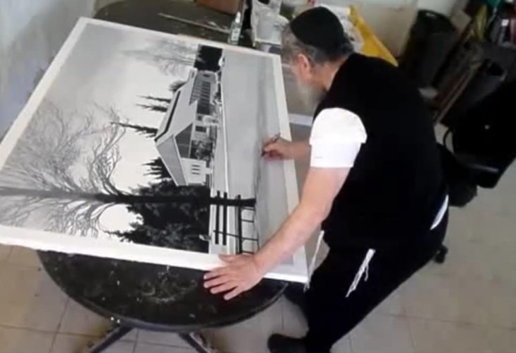 Yair Enavi (today) with one of his paintings Yair Enavi (today) with one of his paintings