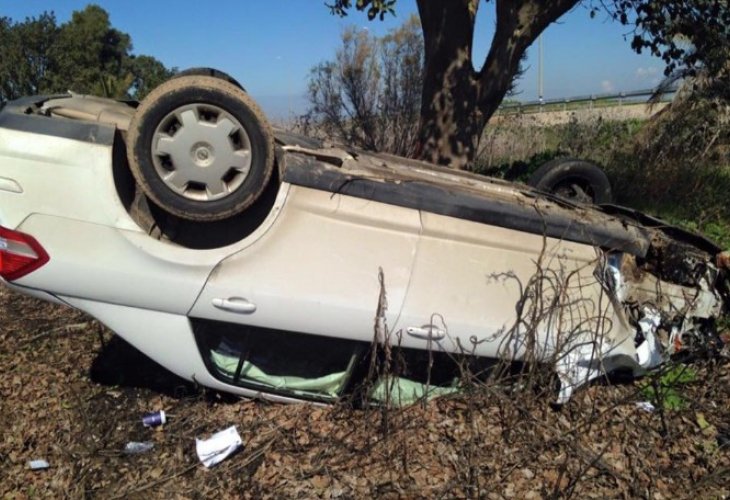 Zohar Aaron's overturned car after the accident Zohar Aaron's overturned car after the accident