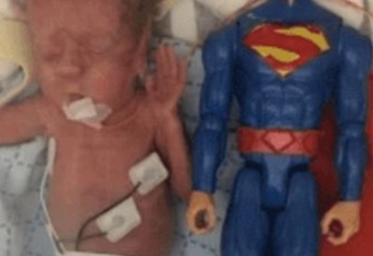 Logan today next to the Superman toy