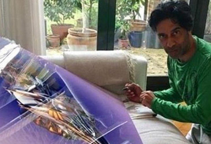 Shiv Grewal against one of his creations Shiv Grewal against one of his creations
