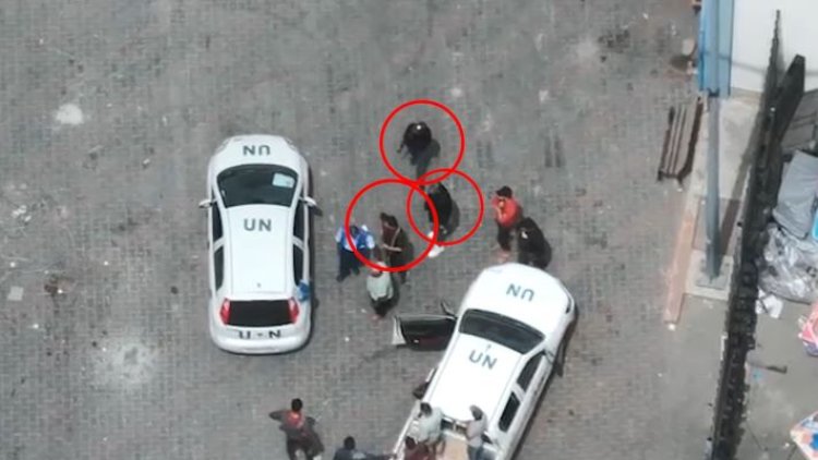 המחבלים ליד כלי רכב של האו"ם (צילום: דובר צה"ל)