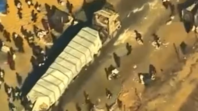 Hamas Terrorists Looting Truck (Photo:CENTCOM/X)