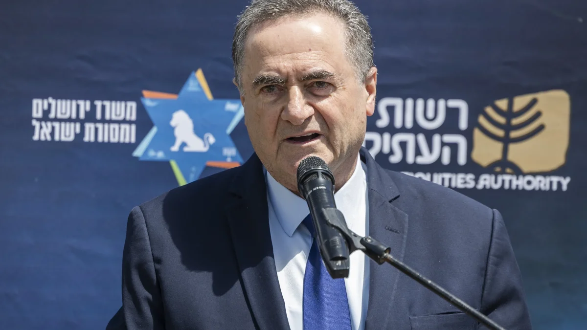 כ
