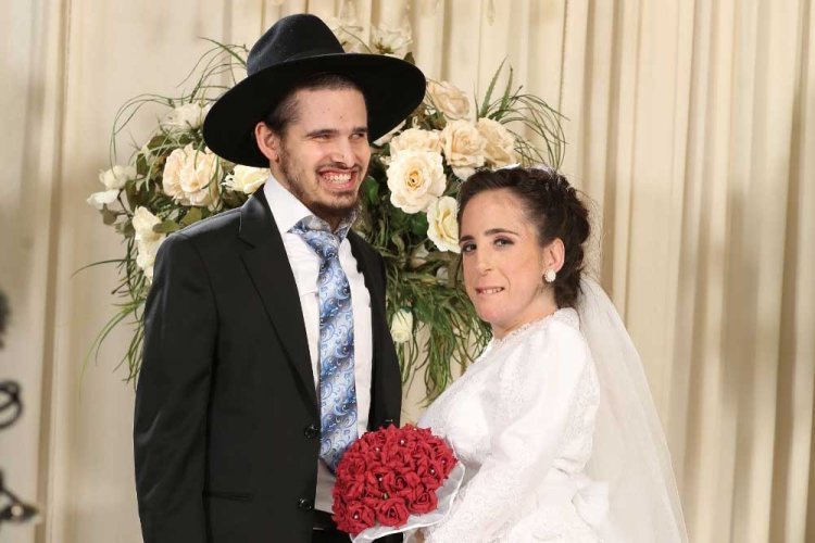 Yosef Chaim and Inbar at their wedding. Photography - Avidan Avraham