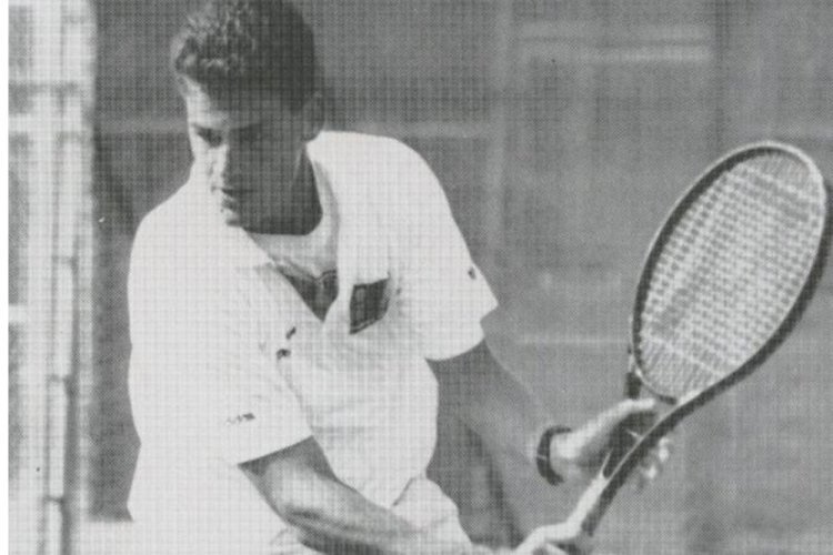 Playing tennis in his youth