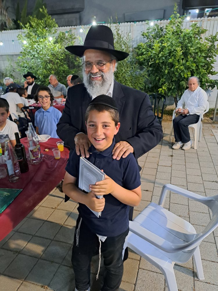 עם תלמיד מצטיין במתמידים