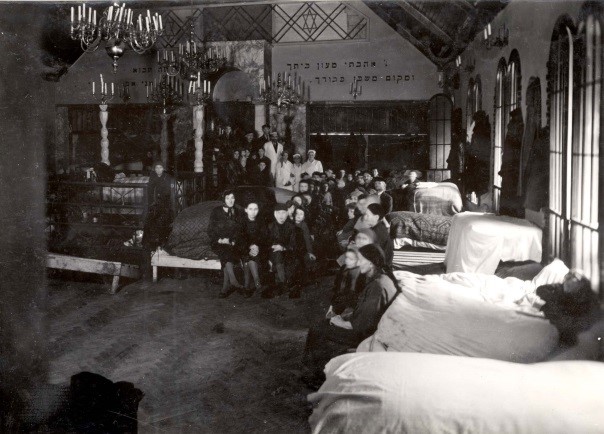 Passover Seder at the refugee shelter at 7 Dzielna Street in the Warsaw Ghetto