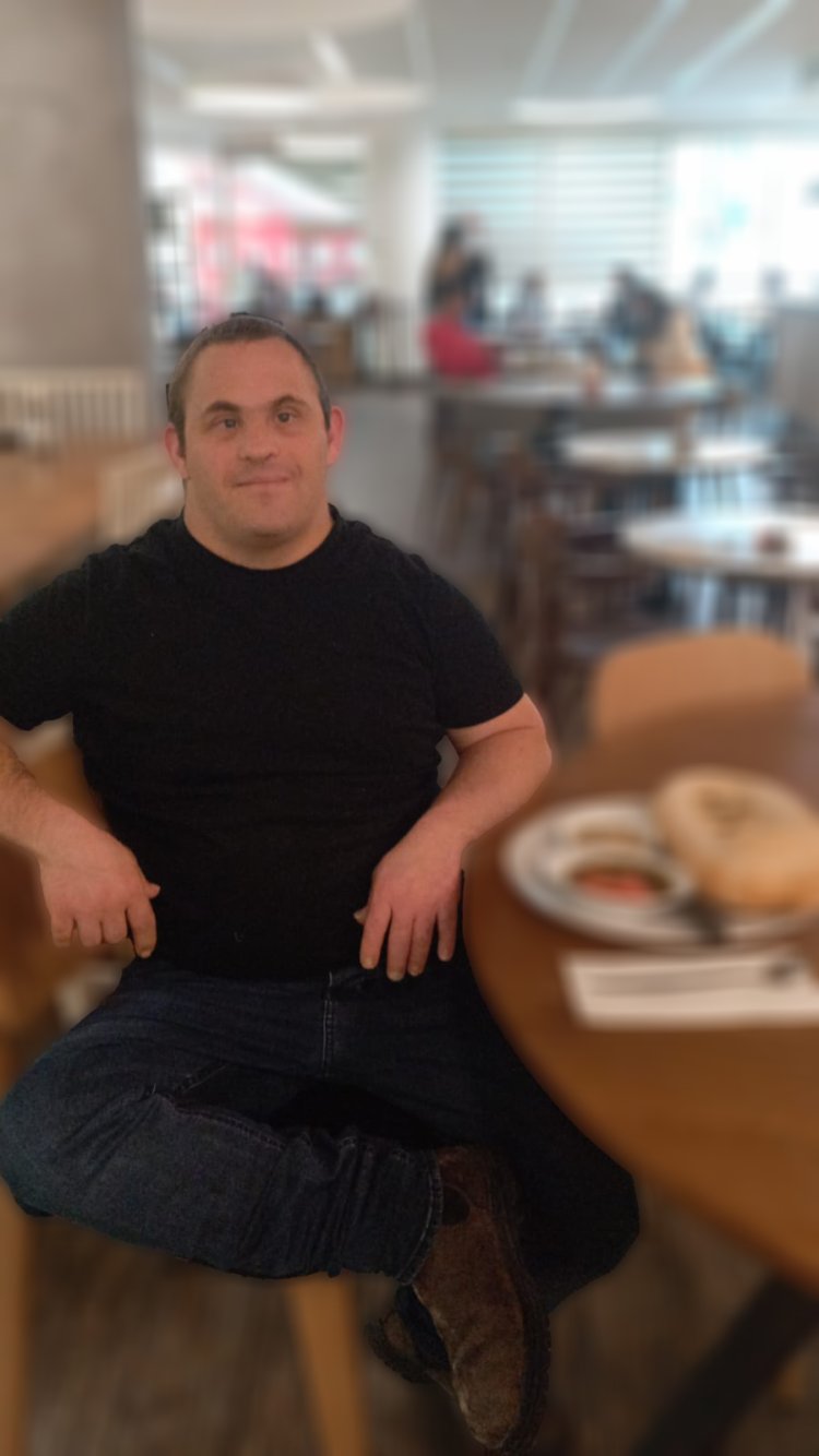 Yair at the cafe where he works