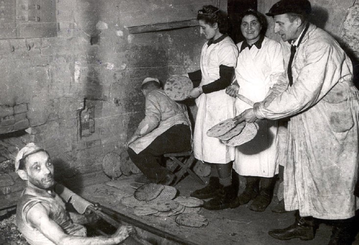 Baking matzah in secret in the Łódź Ghetto, Poland, 1943