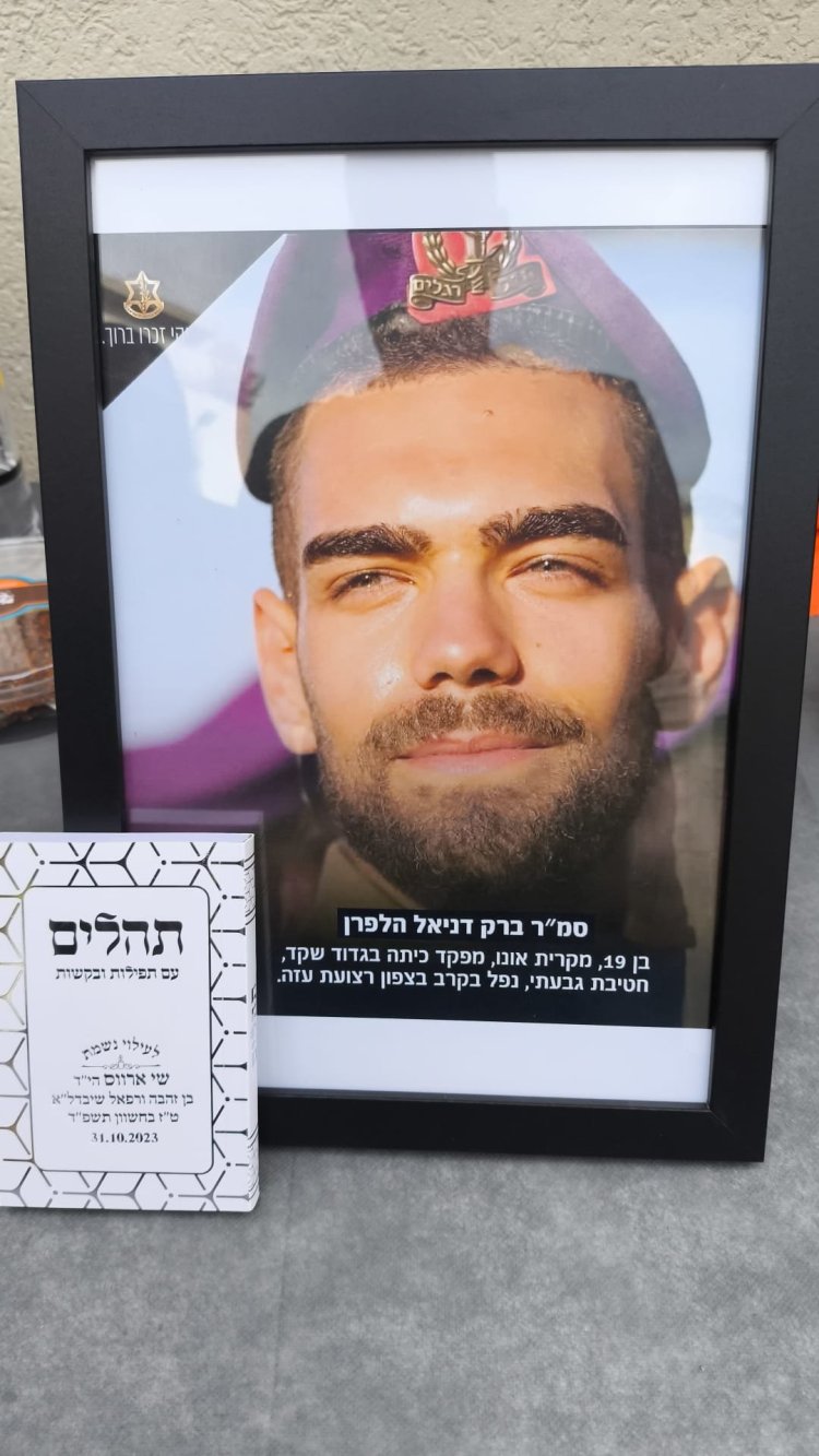 Raphael gives a Book of Psalms and a photo of the fallen son to each family