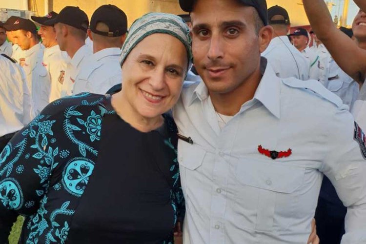Roi z״l with his mother at his firefighters’ course graduation